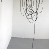 13 Fifty seven stories of one  line, 2011, metal and rubber, 170 x 100 x 25cm, dim variable
