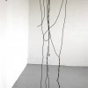 Fifty seven stories of line, 2011, metal rod & rubber line